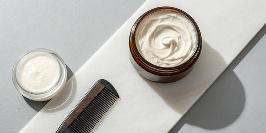 A hair mask and a conditioner side-by-side, comparing the two different hair treatments.
