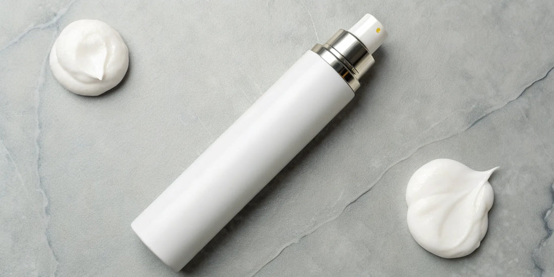 Hair mousse for defining curls shown in a bottle and as a creamy foam.